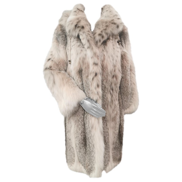 Brand new Montana lynx fur coat with detachable hood size 14 L