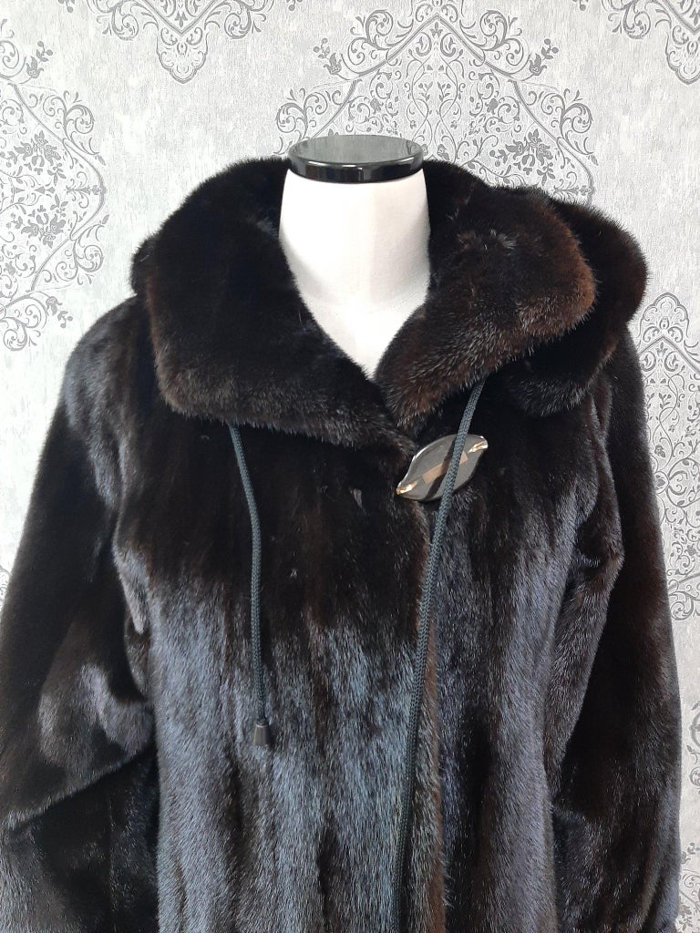 Unused ranch mink fur coat with a hood size 8