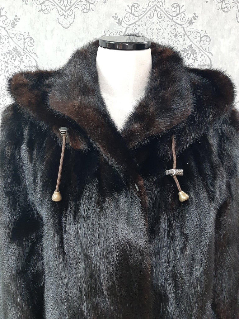 Unused ranch mink fur coat with a hood size 10