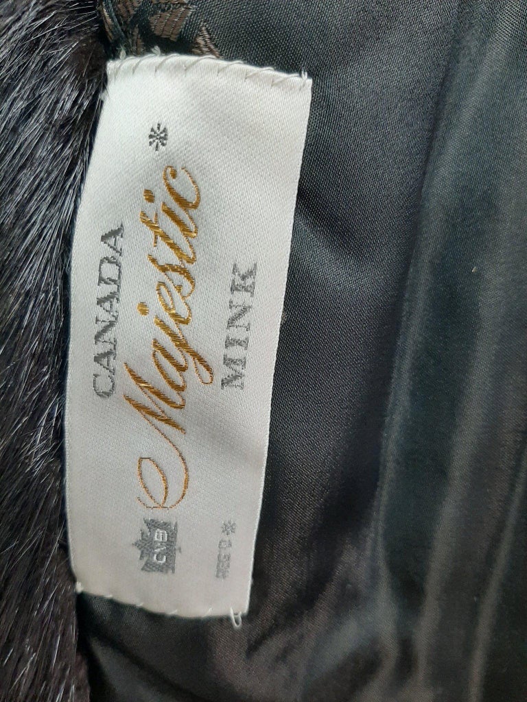 Unused majestic mink fur coat with a hood size 8-10
