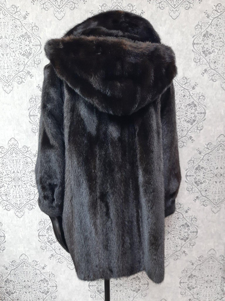 Unused mink fur coat with a hood size 10-12