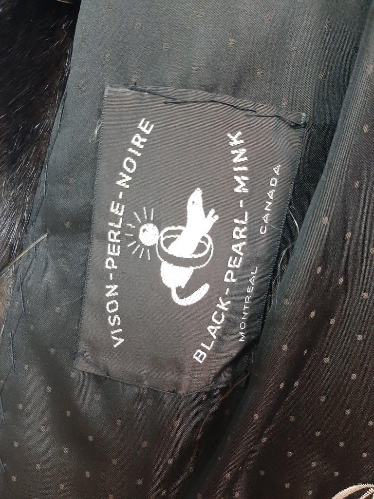 Unused mink fur coat with a hood size 10-12