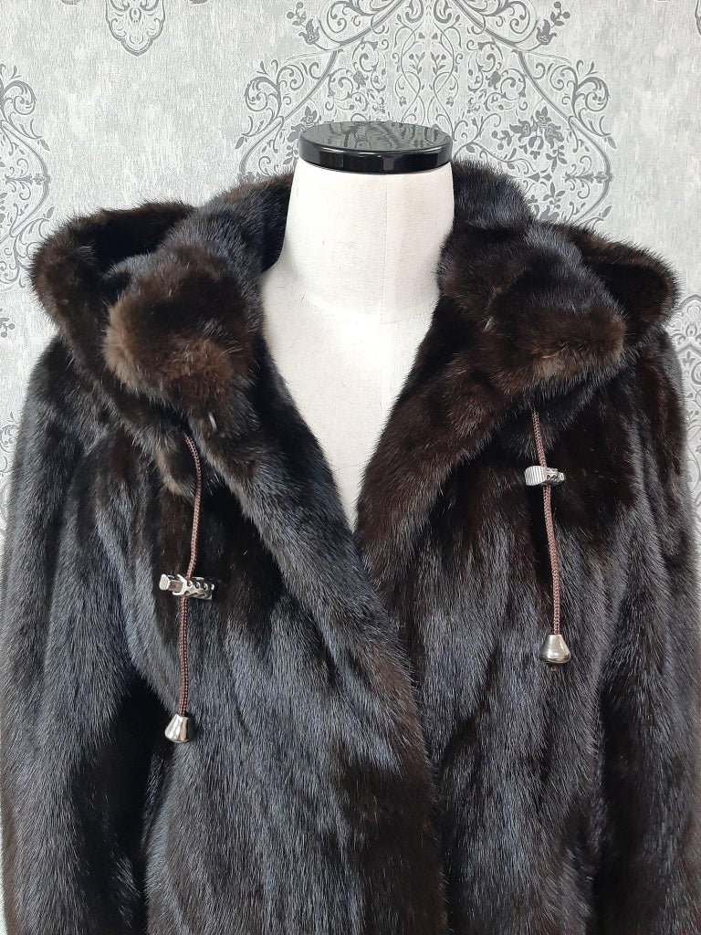 Unused mink fur coat with a hood size 10