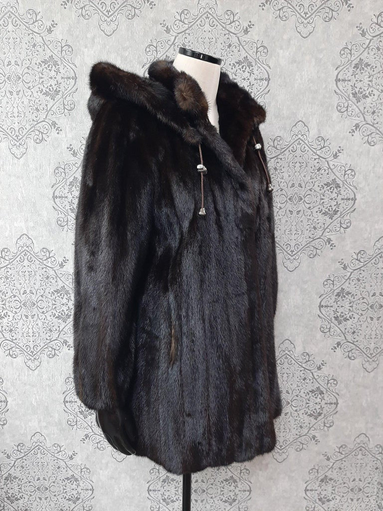 Unused mink fur coat with a hood size 10