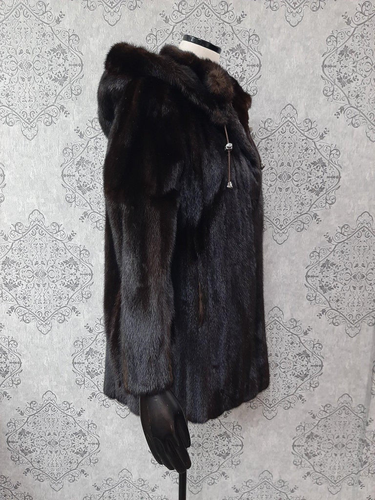 Unused mink fur coat with a hood size 10