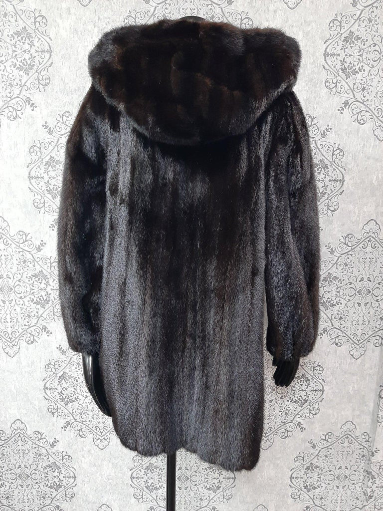 Unused mink fur coat with a hood size 10