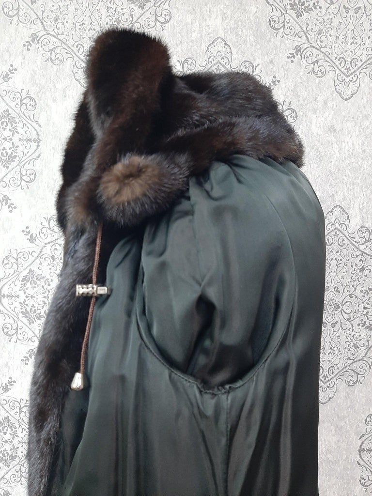 Unused mink fur coat with a hood size 10