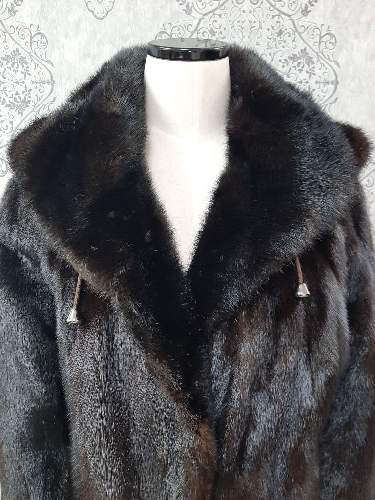 Unused ranch mink fur coat with a hood size 12