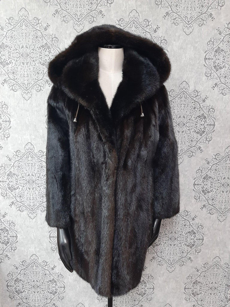 Unused ranch mink fur coat with a hood size 12