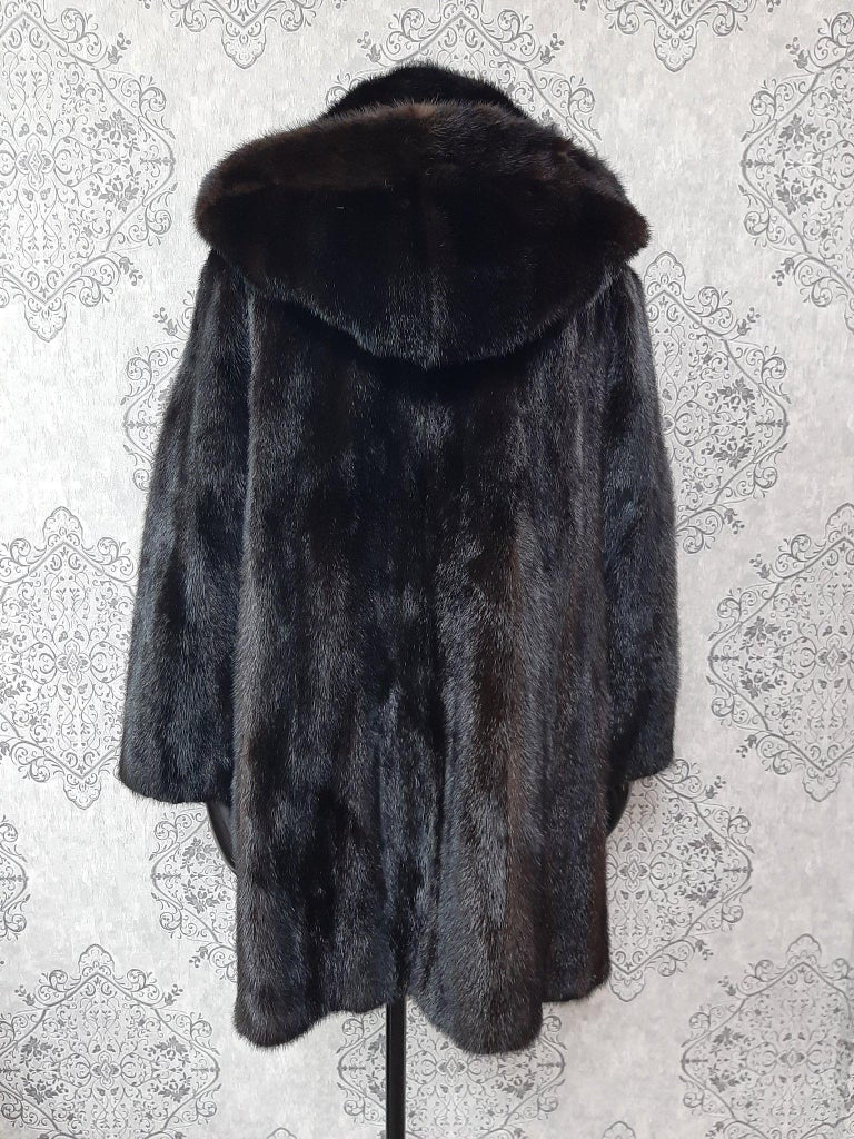 Unused ranch mink fur coat with a hood size 12