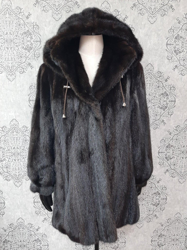 Unused ranch mink fur coat with a hood size 16