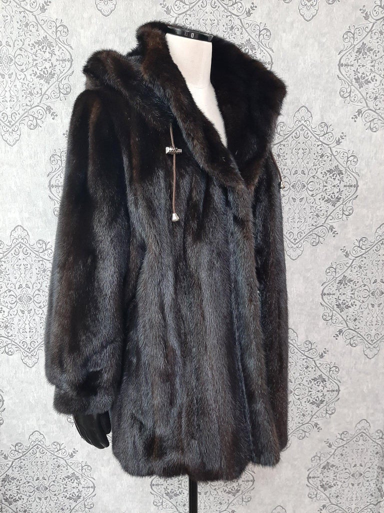 Unused ranch mink fur coat with a hood size 16