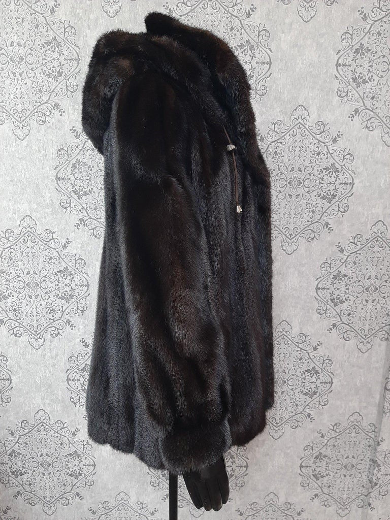 Unused ranch mink fur coat with a hood size 16
